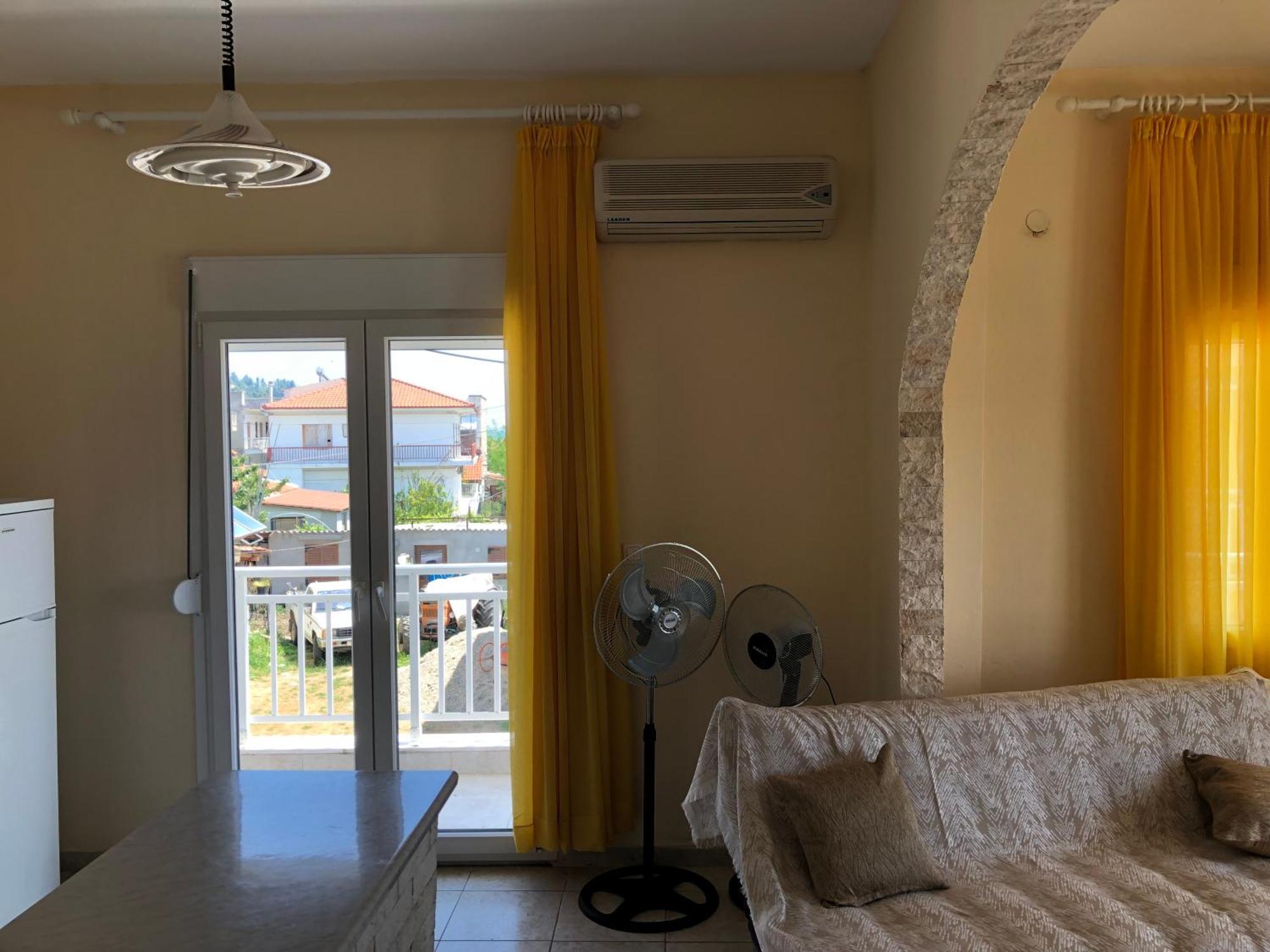 Irida Apartments Néa Skióni Rom bilde